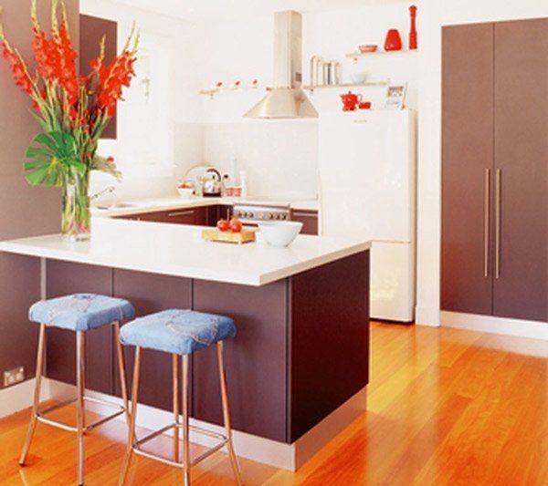 kitchen after renovation with flowers on the counter