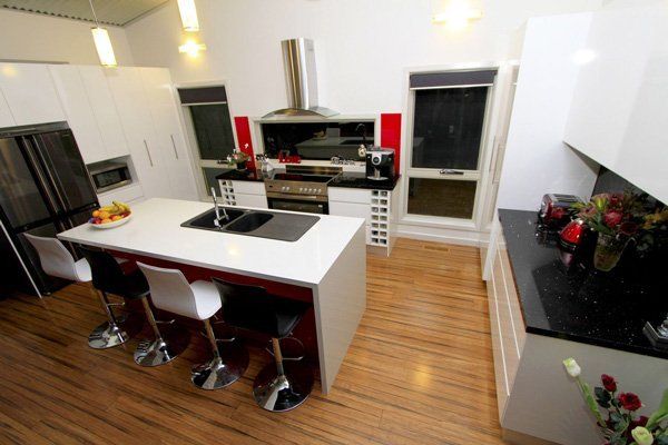 kitchen with wood floors and granite countertops