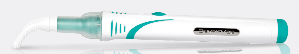 A tube of toothpaste with a toothbrush attached to it.