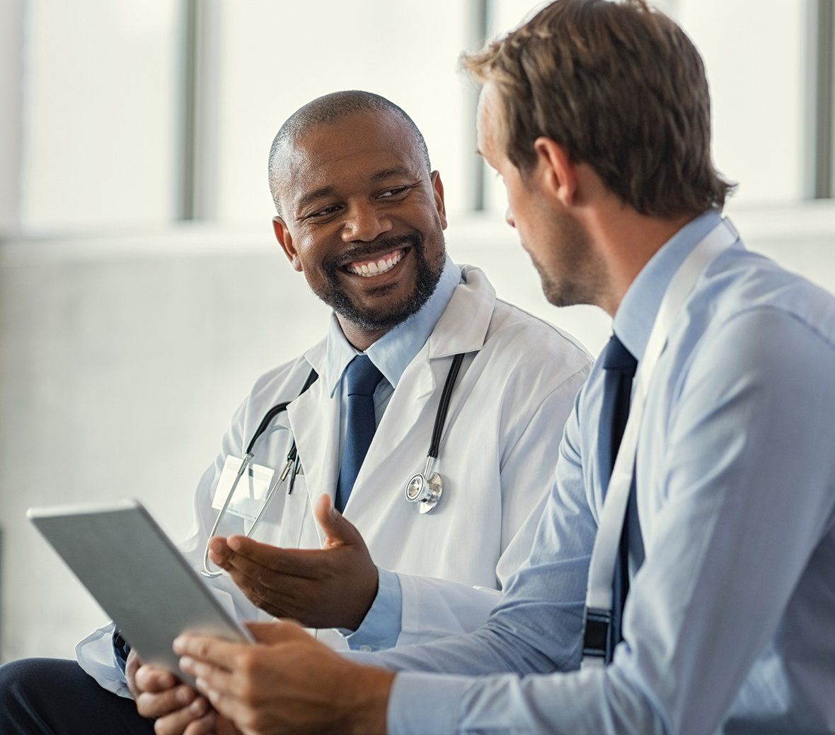 Person Talking to Doctor — Fort Walton Beach, FL — Waldorff Insurance & Bonding Person Talking to Doctor — Fort Walton Beach, FL — Waldorff Insurance & Bonding