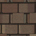 Close-up of brown and tan asphalt roof shingles.