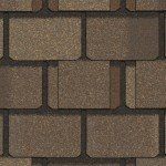 Brown architectural shingles in a repeating brick pattern.