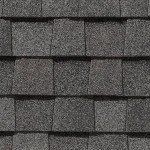 Dark gray asphalt roof shingles.