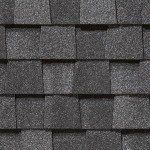 Dark gray asphalt roof shingles.