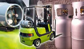 Forklift Preparing to Move Large Propane Tanks - Propane Fuel Center in Baldwin County Alabama