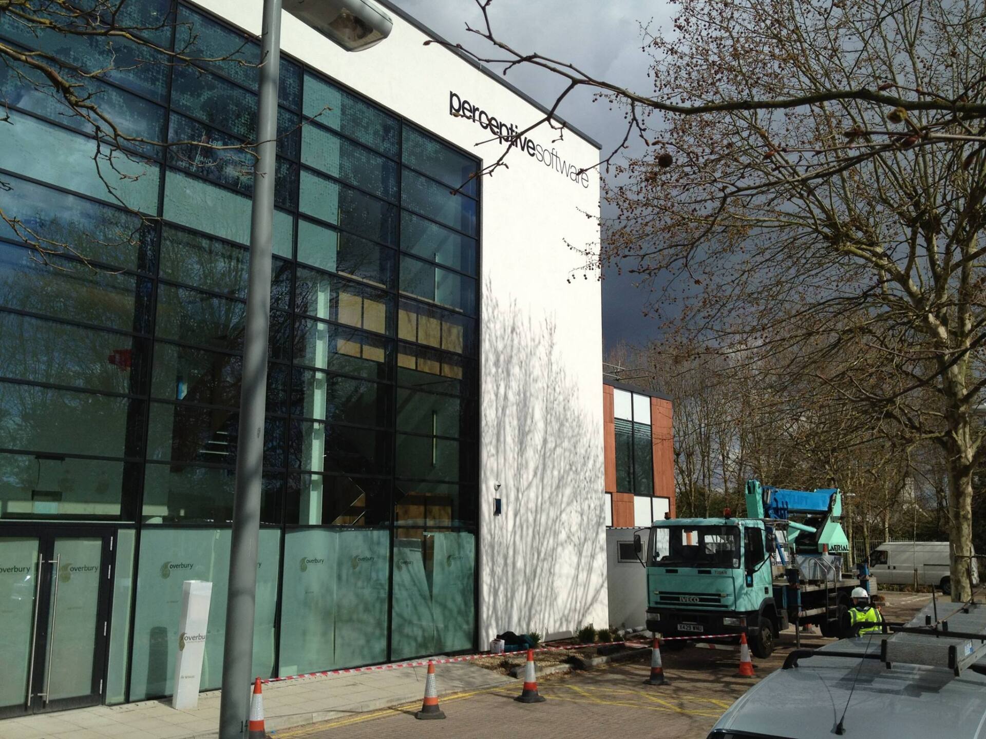 Installing sign on large office building
