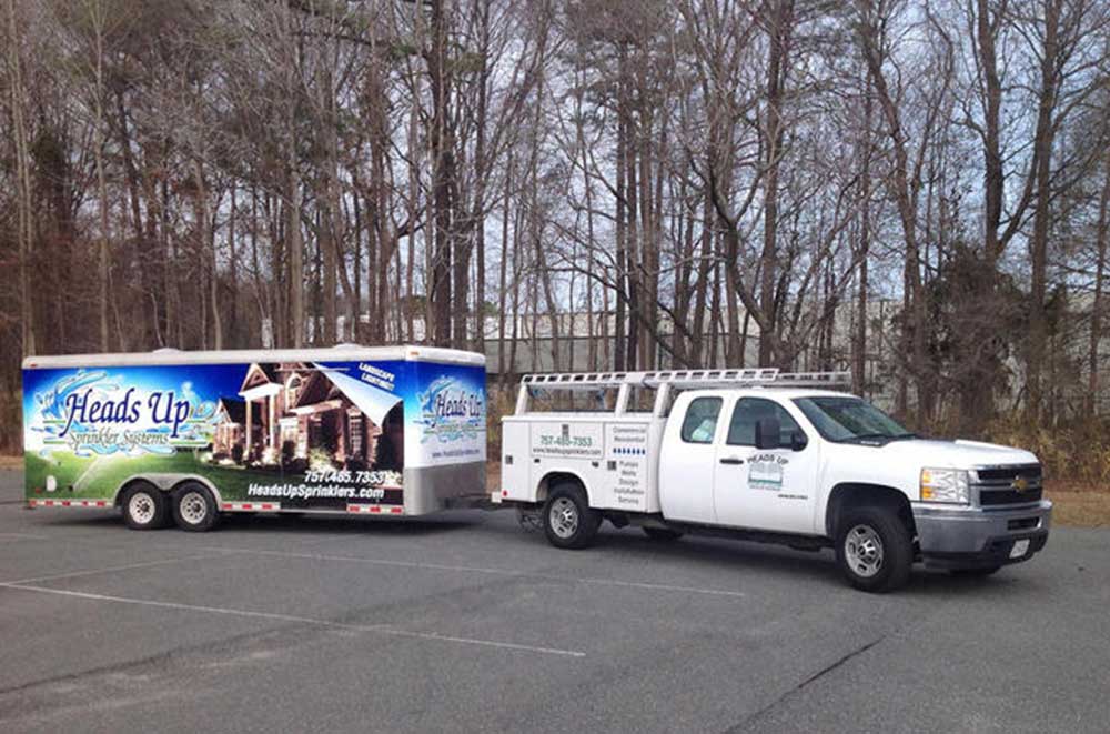 Heads Up Sprinklers Truck and Trailer — Chesapeake, VA — Heads Up Sprinkler Systems Heads Up Sprinklers Truck and Trailer — Chesapeake, VA — Heads Up Sprinkler Systems