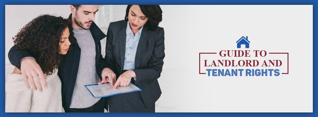 Two women and one man look over a contract together