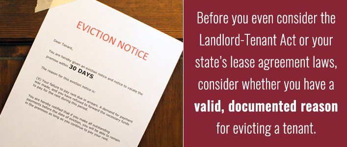 Eviction notice hanging on a wooden door