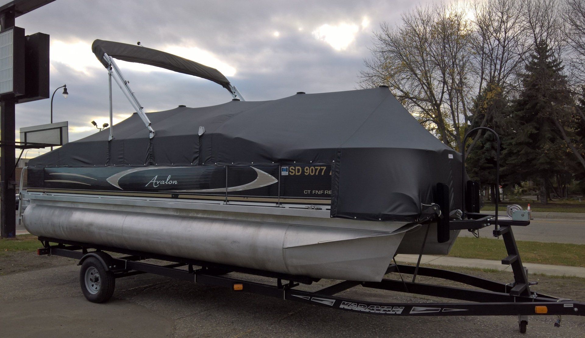 Black Pontoon — Moorhead, MN — Olson Awning & Canvas