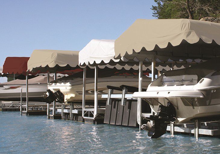 Boats Under Lift Canopy — Moorhead, MN — Olson Awning & Canvas
