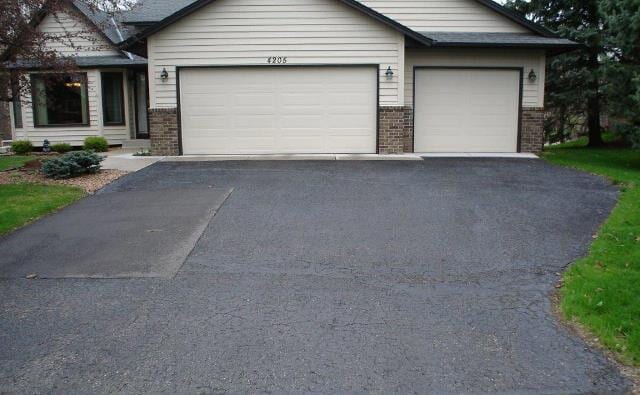 Asphalt — Before Repair & Maintenance in Medina, MN Asphalt — Before Repair & Maintenance in Medina, MN