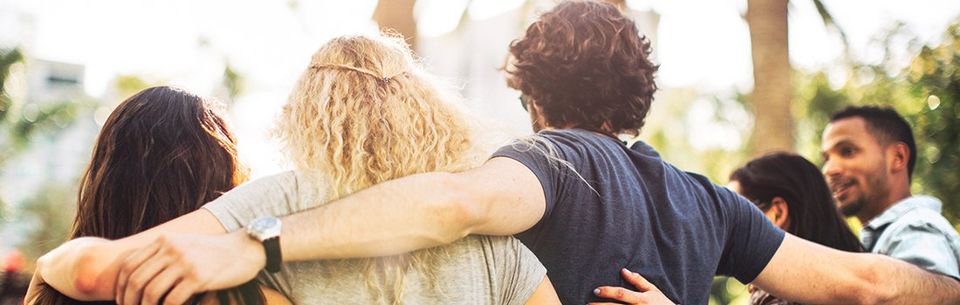 Friends in LA with arms around each other | Kolsky Realty and Management Co