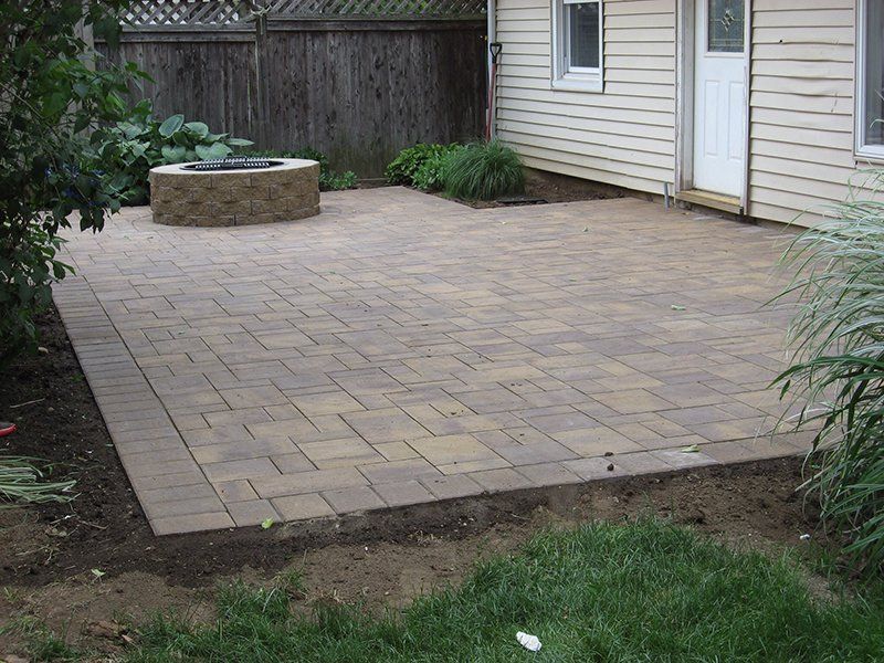 round fire place with round rocks around it's base