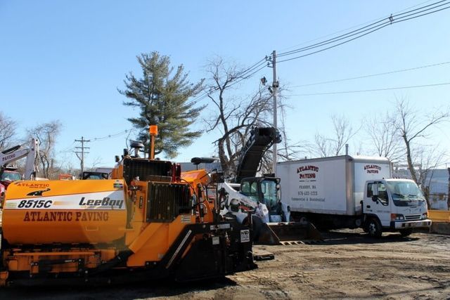 Different Paving Trucks — Peabody, MA — Atlantic Paving Corp.