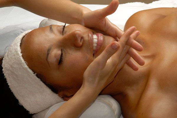 Salon — Woman Getting A Face Treatment in Temple Hills, MD