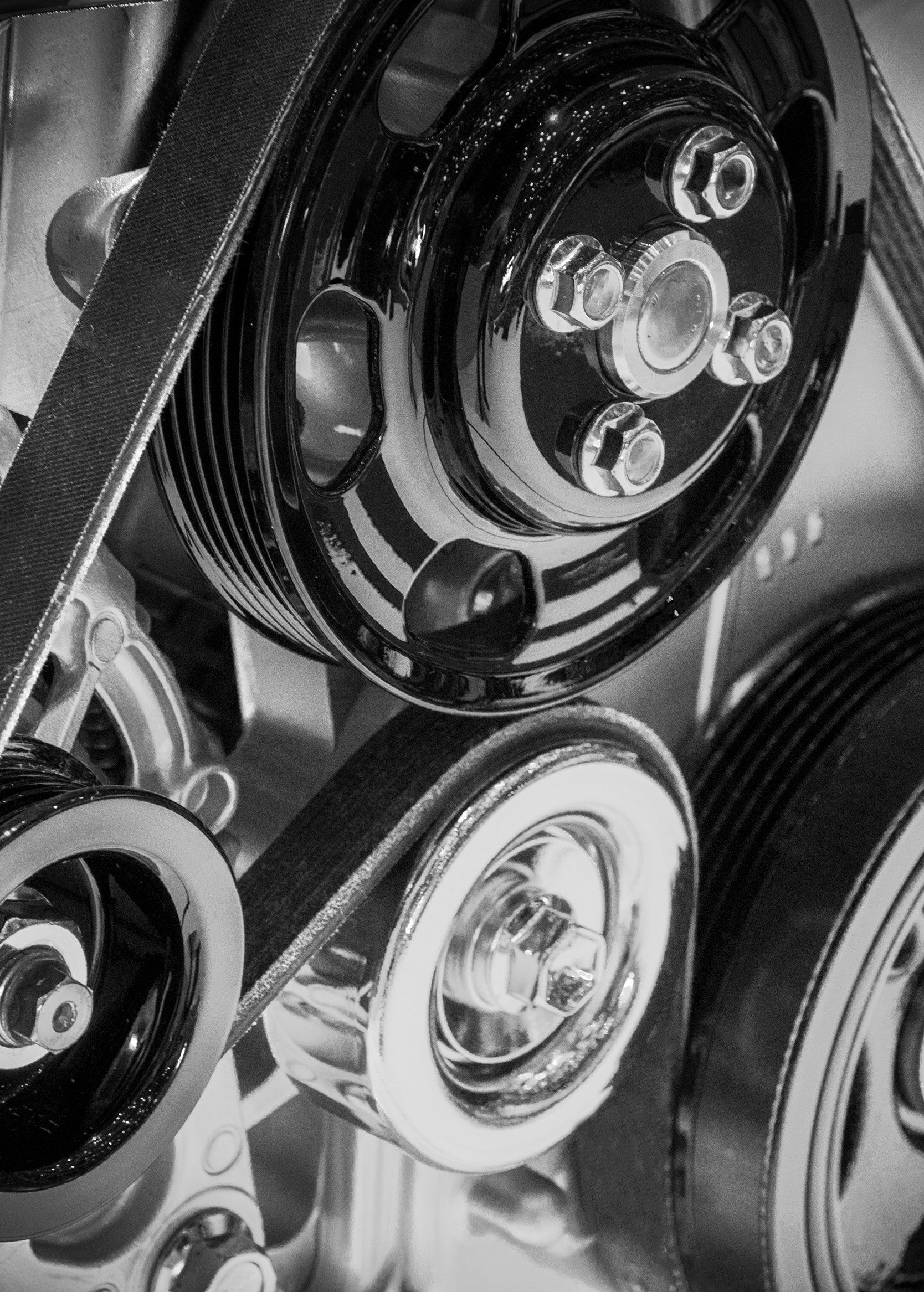 Engine Upgrade Shop — Pulley And Belts On A Car Engine in Agawam, MA
