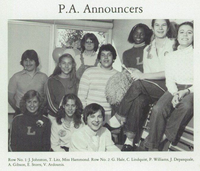 A black and white photo of p.a. announcers posing for a picture