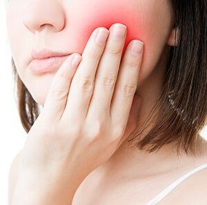 Girl Having a Toothache — Gum Disease in Deerfield Beach, FL Girl Having a Toothache — Gum Disease in Deerfield Beach, FL