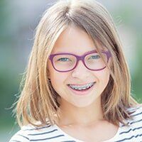 Girl with Braces — Orthodontics in Deerfield Beach, Fl Girl with Braces — Orthodontics in Deerfield Beach, Fl