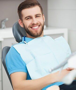 Man Having Dental Check Up — Dental Services in Deerfield Beach, FL Man Having Dental Check Up — Dental Services in Deerfield Beach, FL