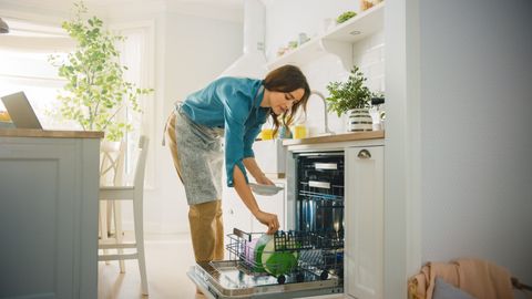 Man Working On A Dishwasher – Orlando, FL – Willard Appliance Inc.