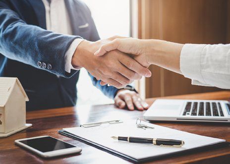 Agent Shaking Hands With His Client — Philadelphia, PA — Summit Insurance Agent Shaking Hands With His Client — Philadelphia, PA — Summit Insurance