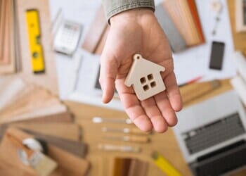 A Man With A Wooden House In His Hand — Philadelphia, PA — Summit Insurance A Man With A Wooden House In His Hand — Philadelphia, PA — Summit Insurance