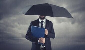 Insurance — Insurance Agent With Umbrella in Philadelphia, PA Insurance — Insurance Agent With Umbrella in Philadelphia, PA