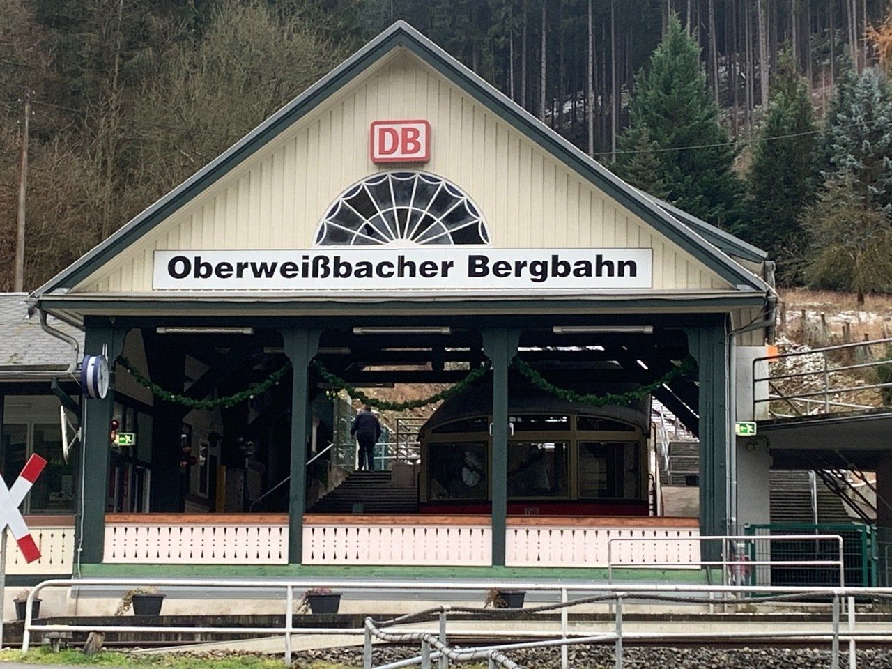 Railway station: Oberweißbacher Bergbahn, Germany, DB logo, train platform.