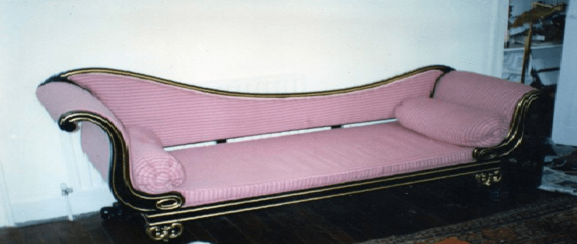 Black polished with gold leaf trimmings day bed. Fully restored & upholstered by W. G. Francis.