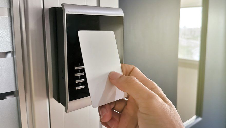 Hand Using Key Card — Kernersville, NC — Hodges Triad Electric Co LLC