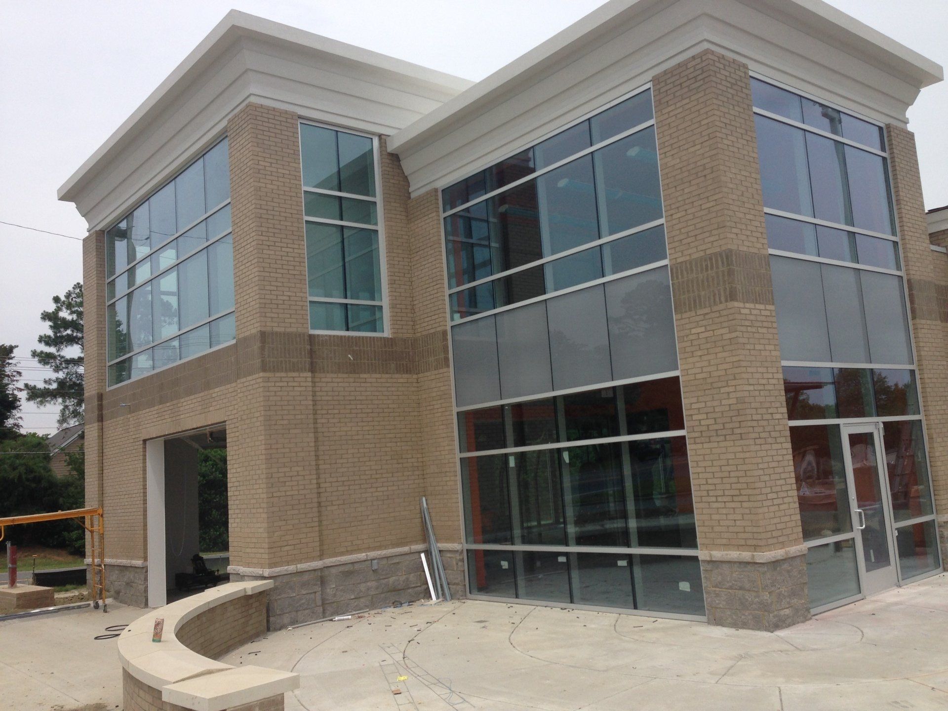 Commercial building with glass storefront windows and doors by Rhodes Glass.