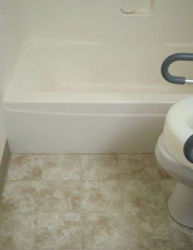 White Wave Tubliner with River Rock Walls — N. Charleston, SC — Surface Specialists