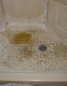 Before Shower Pan Refinish — N. Charleston, SC — Surface Specialists
