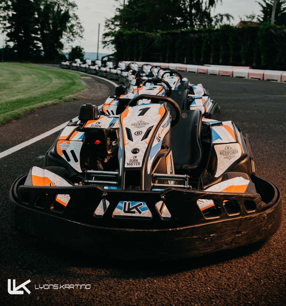 Lyons Karts lined up on the track