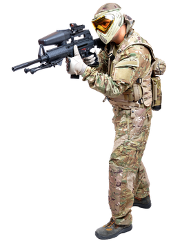 Person in action with full paintball outfit and pointing gun