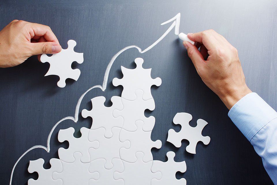 man joining the puzzle