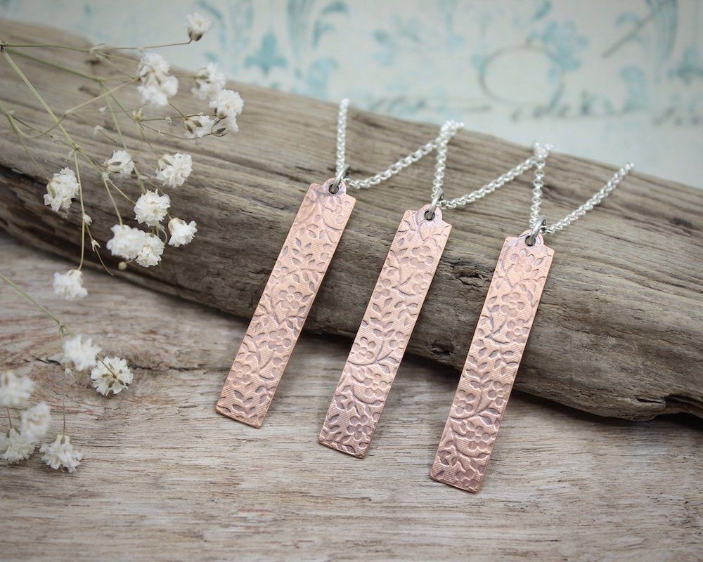 Embossed Copper Floral Pendant Bar Necklace With Solid Silver Chain