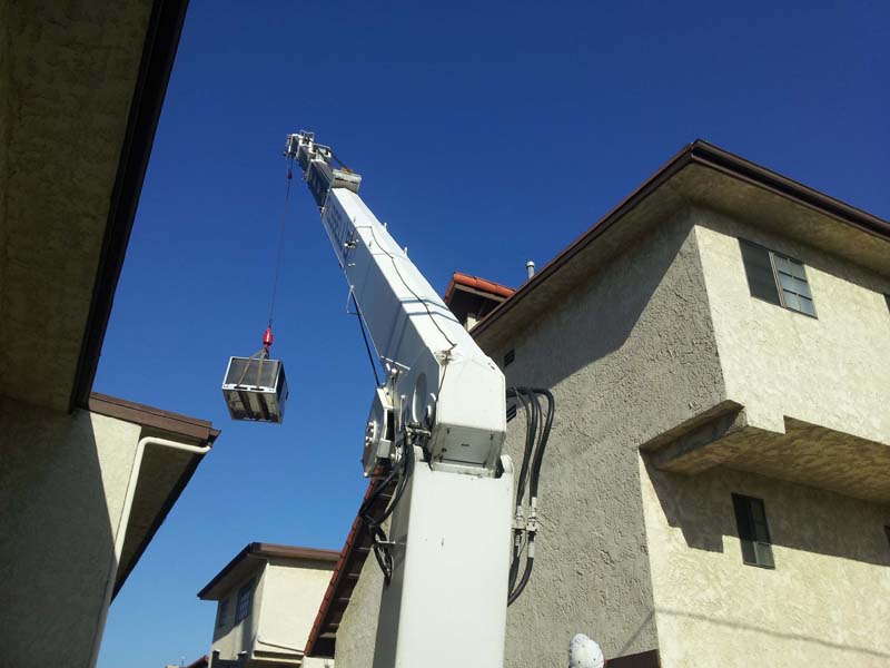 new_package_unit_lifted_by_crane