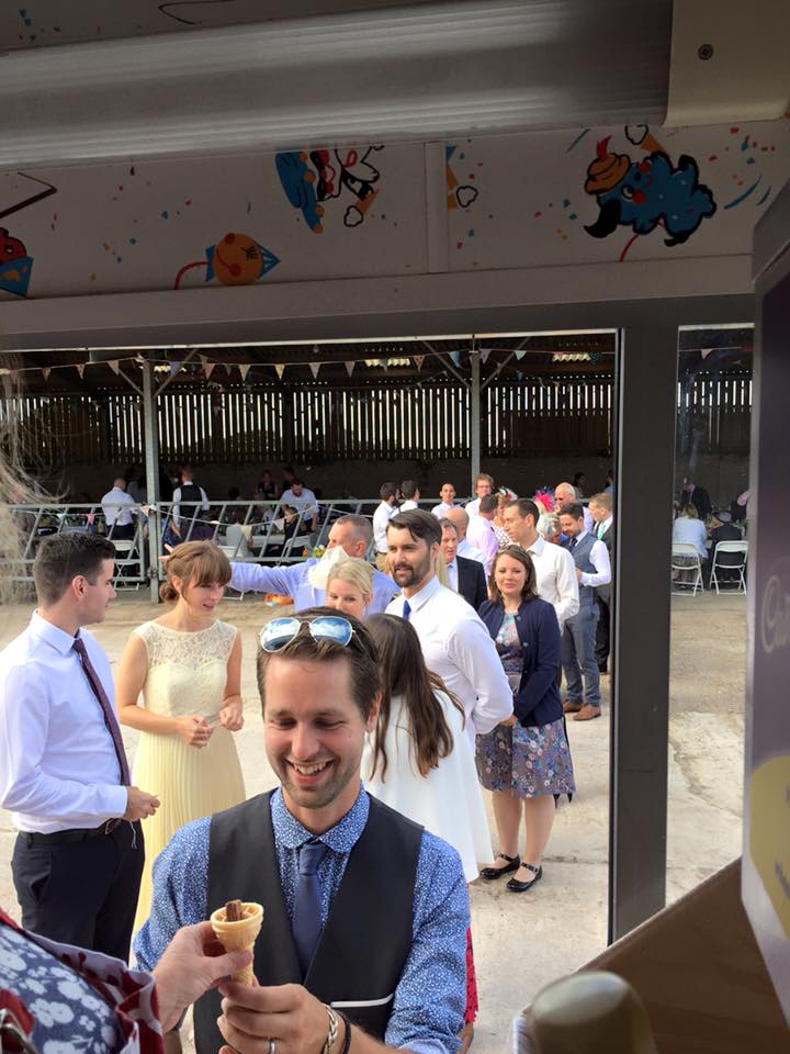 people waiting to buy ice cream