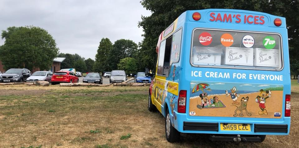 people in a queue to buy ice cream