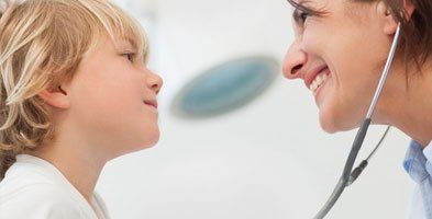 A doctor treating a kid