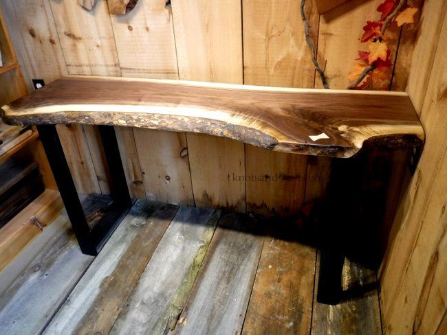 Live edge computer desk made with black walnut and steel.