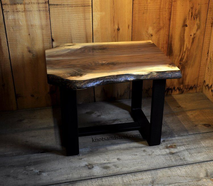 Live edge end table made with Walnut and steel.