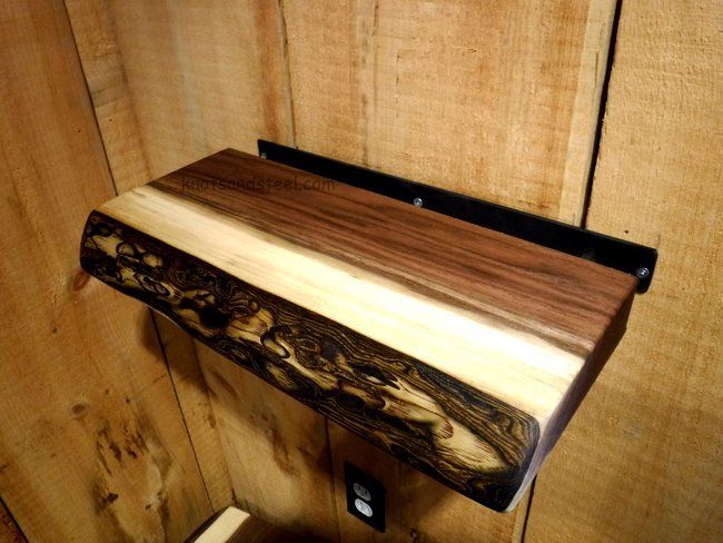 Live edge floating shelves with steel bracket.