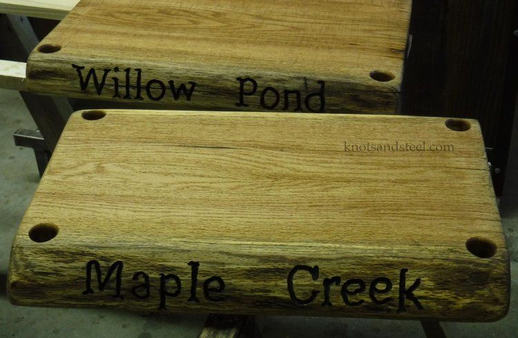 Swing seats made with live edge wood slabs.