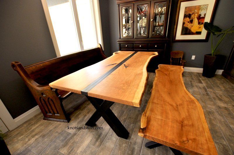 Dining room table made with live edge black cherry wood from local Ontario wood. 