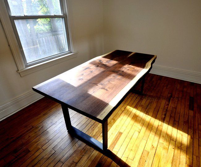 Black Walnut Live edge dining table.
Solid steel frame.