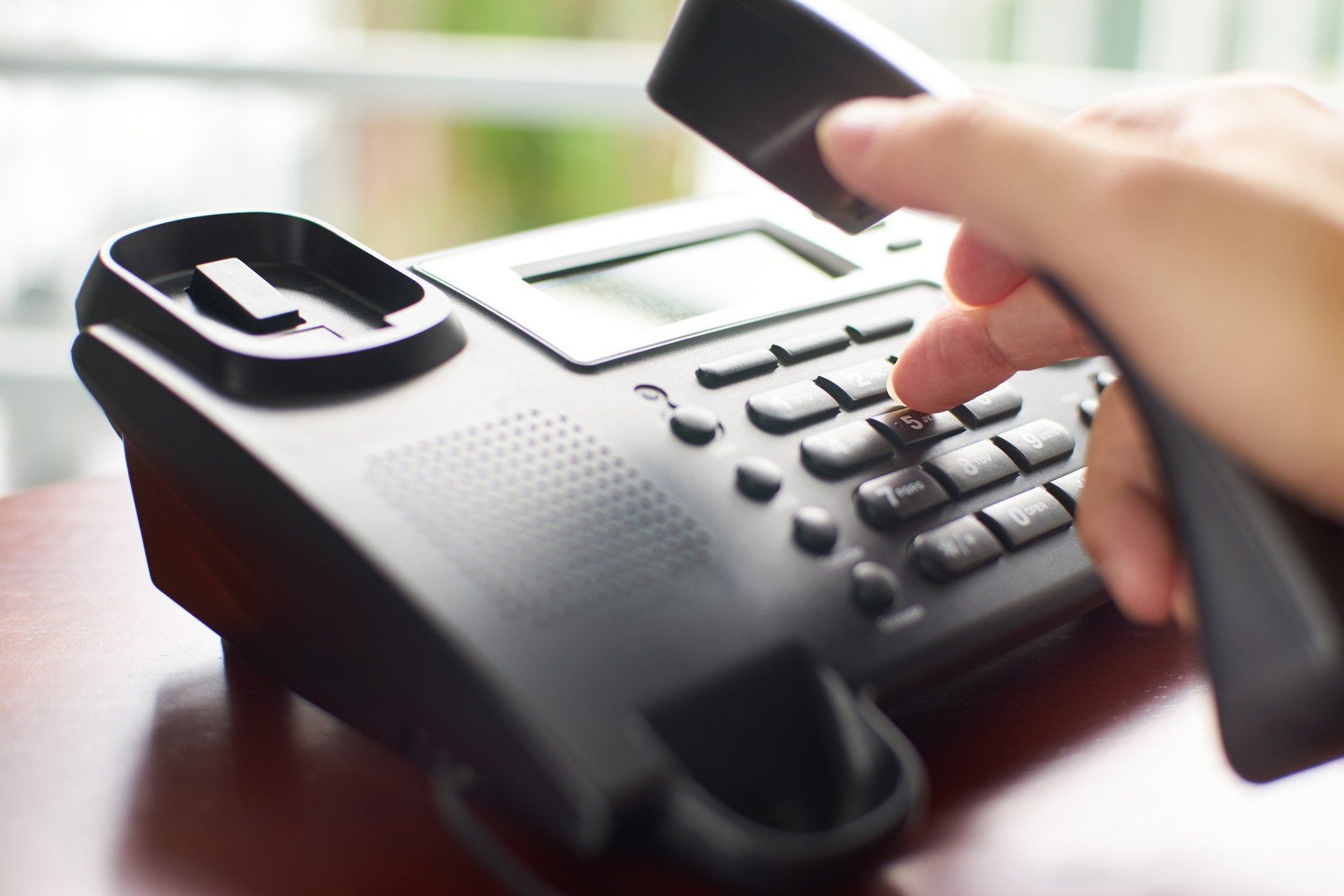 Dialing on the phone — Canton, OH — Northern Mobile Electric